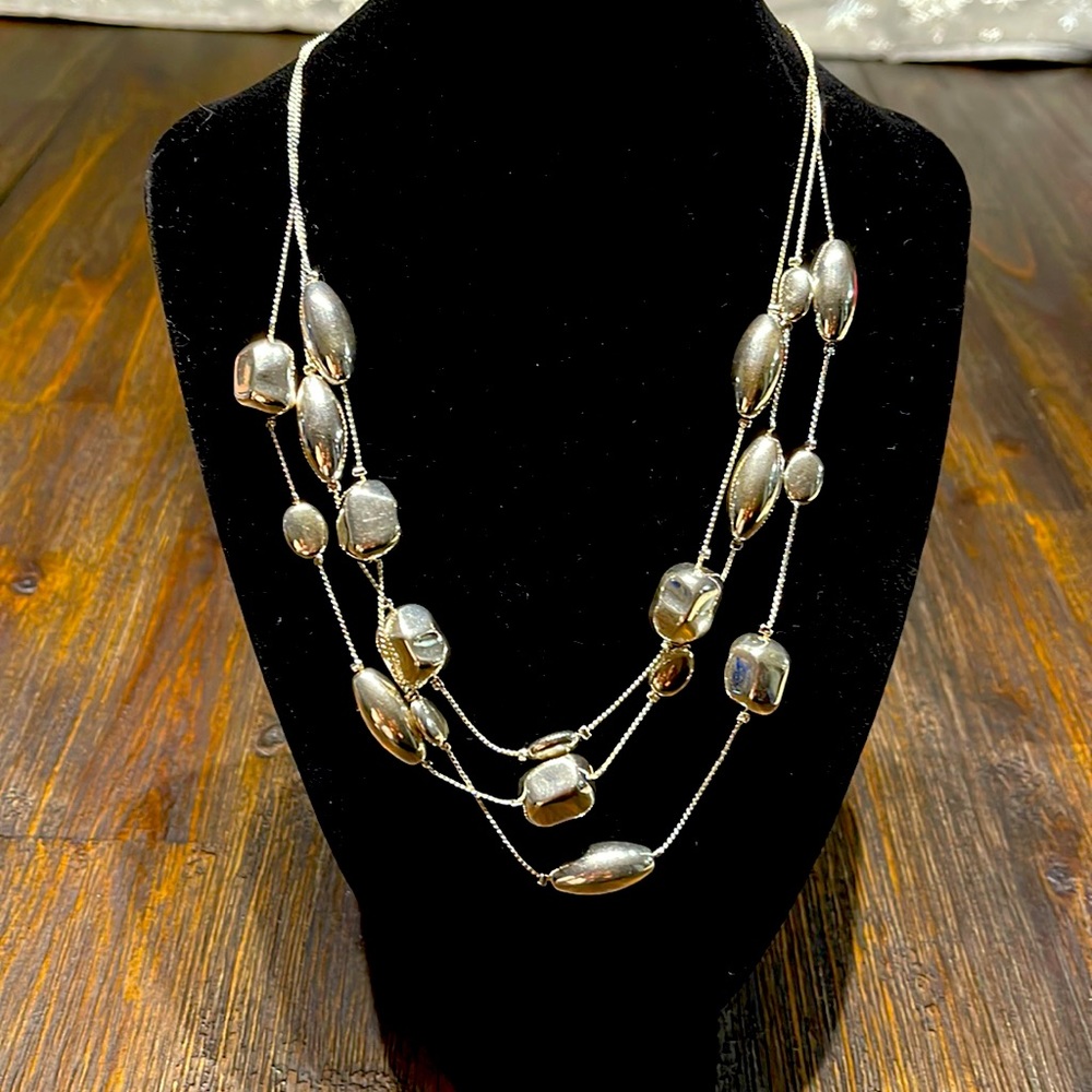 3 strand adjustable necklace. Laid flat 20" length